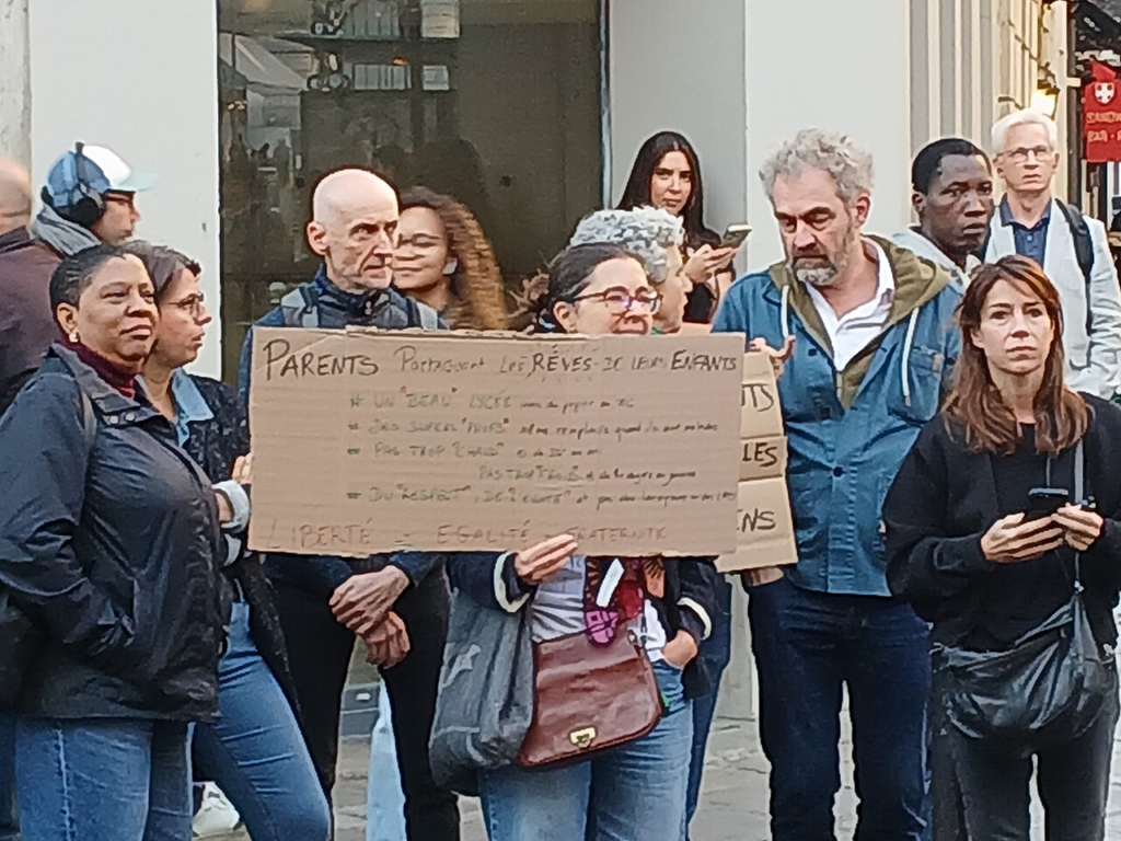Why Is Paris Protesting? Schools, Living Costs and Public Anger Explained 2 Parents participating in the October 2026 mobilisation outside Condorcet High School in Paris
