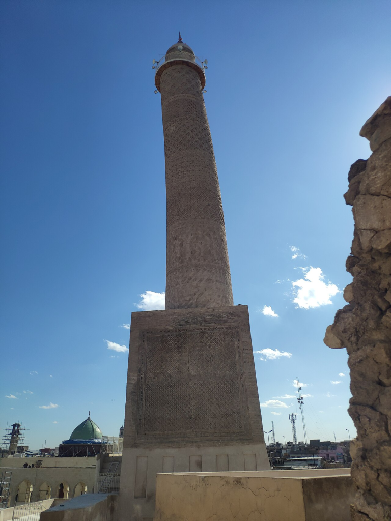 Gaza’s Reconstruction: Who Gets to Decide What Comes Back? 6 The reconstructed Al-Hadba Minaret at the Al-Nouri Mosque complex in Mosul, photographed in February 2025