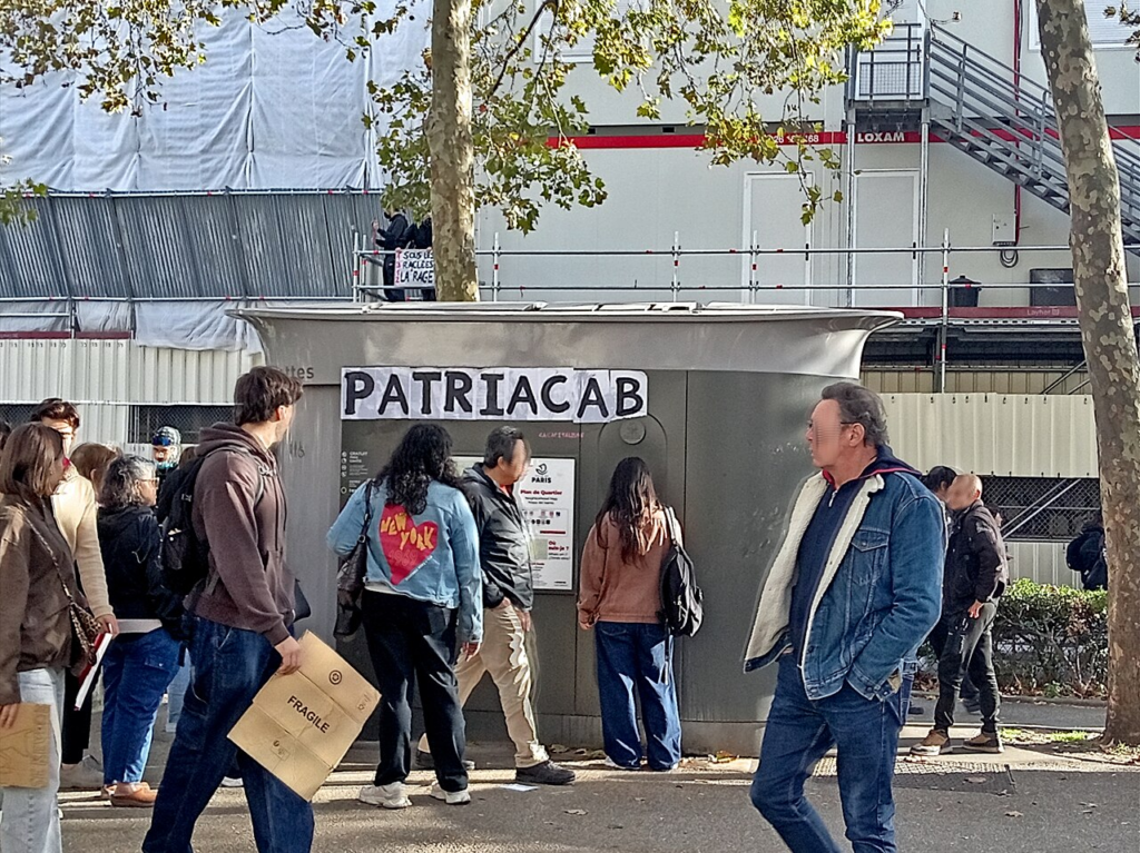 Why Is Paris Protesting? Schools, Living Costs and Public Anger Explained 8 Political messages visible in public space during the Paris demonstration of 17 October 2026