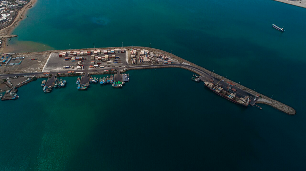 Aerial photograph of Shahid Kalantari Port in Chabahar, showing the physical relationship between cargo-handling infrastructure and the surrounding coastal territory. This is a different facility from the Shahid Beheshti terminal covered by India's 2024 agreement