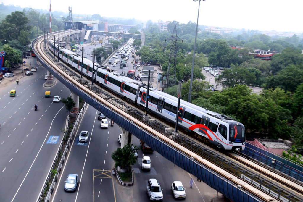 Elevated Delhi Metro Airport Express line above an urban road