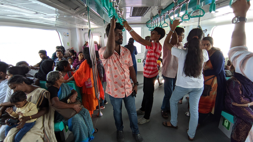 Passengers inside a Kochi Water Metro vessel