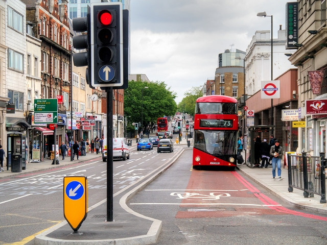 A bus lane approaching traffic signals on Pentonville Road, King’s Cross